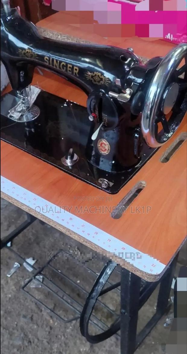 New Singer Sewing Machine
With Local Table