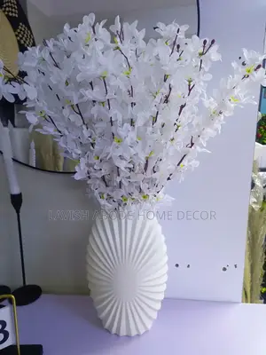 White Unbreakable Oval Vase With Yellow Flowers