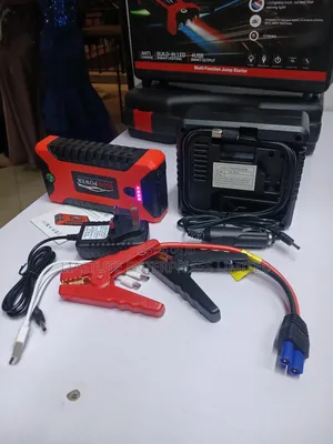 Vehicle Jump Starter With Emergency Tools