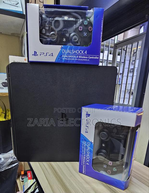 Ps4 Slim With 2 New Controllers, Super Clean