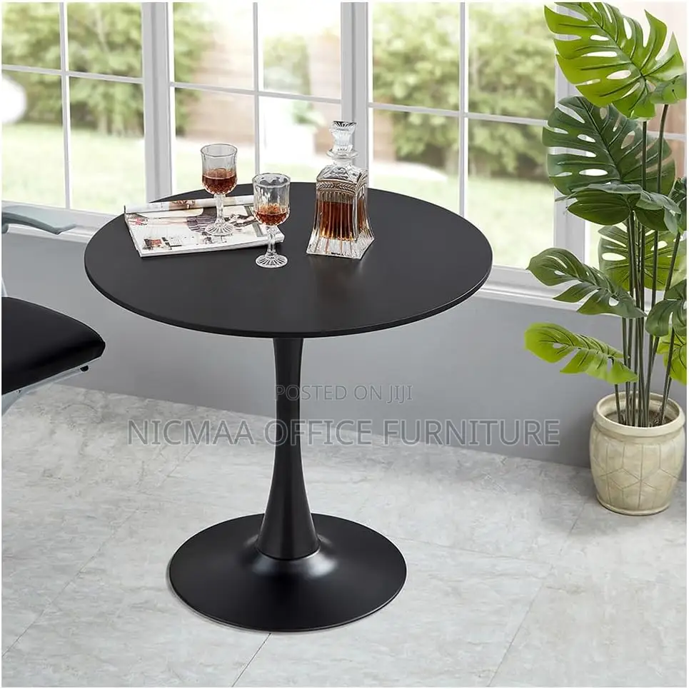 Sleek Pedestal Base Modern Round Table