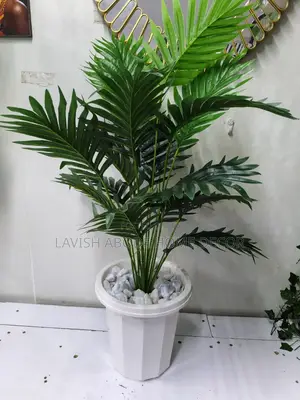 Artificial Fern Plant in a White Flower Pot