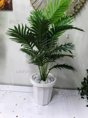 Artificial Fern Plant in a White Flower Pot