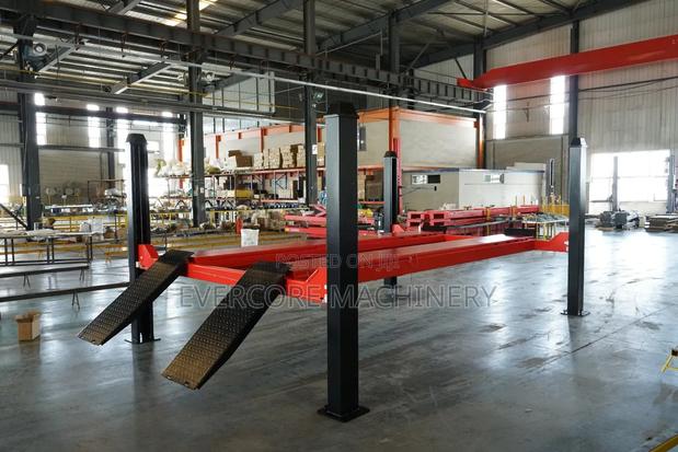 Commercial Sunshine Italy Four Post Lift Machine. - main view