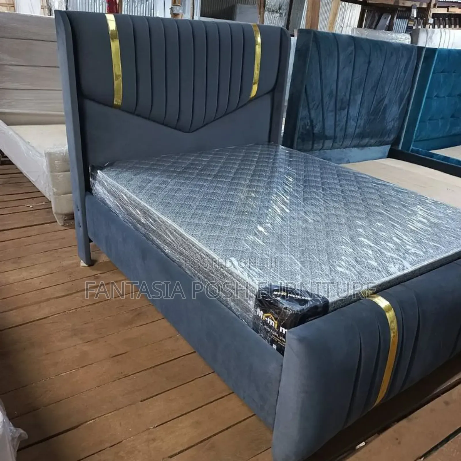 5x6 Grey Upholstered Bed With Gold Accent Trim