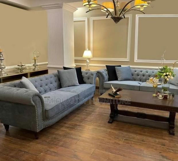 Light Gray Tufted Chesterfield Sofas