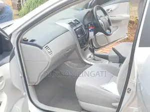 Chauffeured Toyota Axio for Hire — Reliable Affordable
