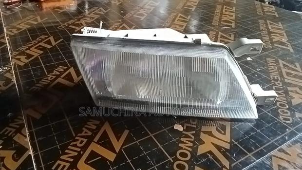Headlight Nissan Sunny B14 Rhs( Plastic)