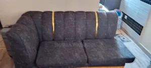 A 5 Seater Sofa Grey in Color