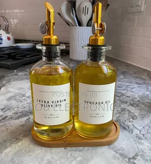 A Pair Of Oil Dispenser Bottles