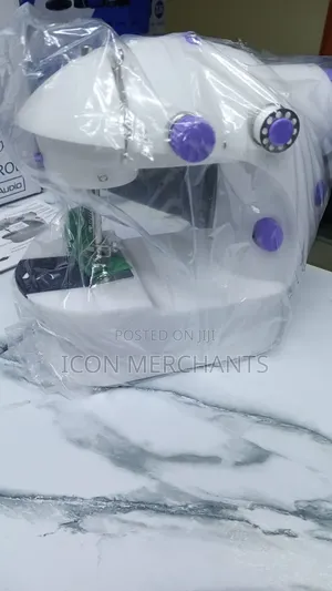 Mini Sewing Machine With a Pedal