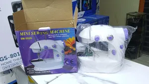 Mini Sewing Machine With a Pedal