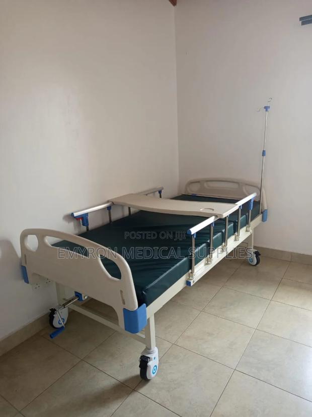 Single Crank Bed With Mattress and Over Table - main view