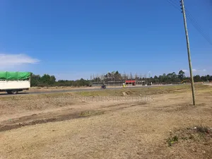Plot on Tarmac [ Ha - Gituku ]