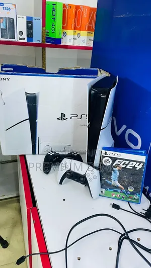 Ps5 Slim Clean With Two Controllers Boxed and One Game.