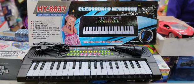 Kid Playing Quality 37 Keys Piano Keyboard