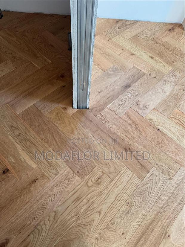 Elegant Herringbone SPC Floors – Durable Modern Design