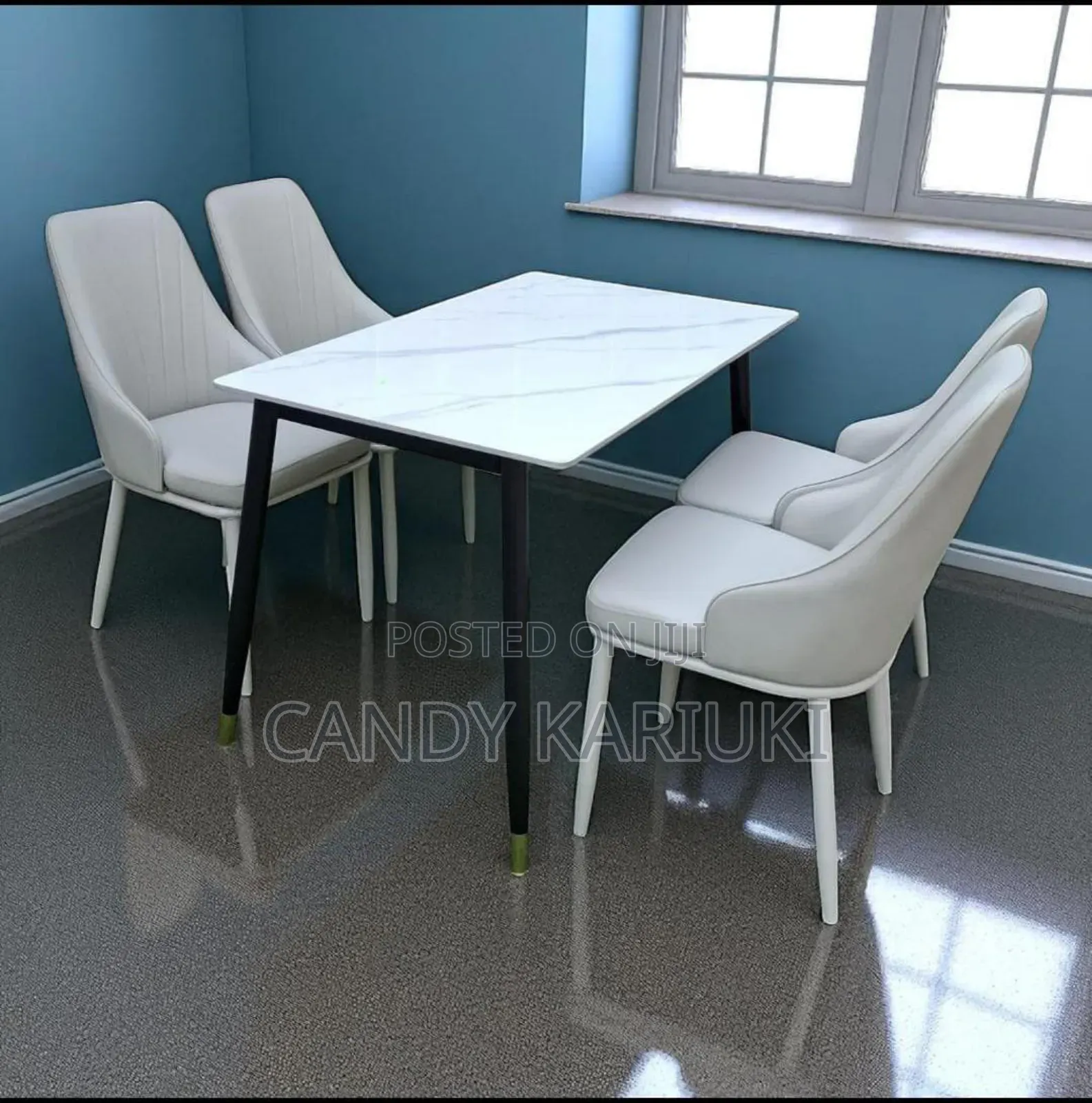 Elegant 4 Seater Marble Dining Set With a Sleek Marble Top