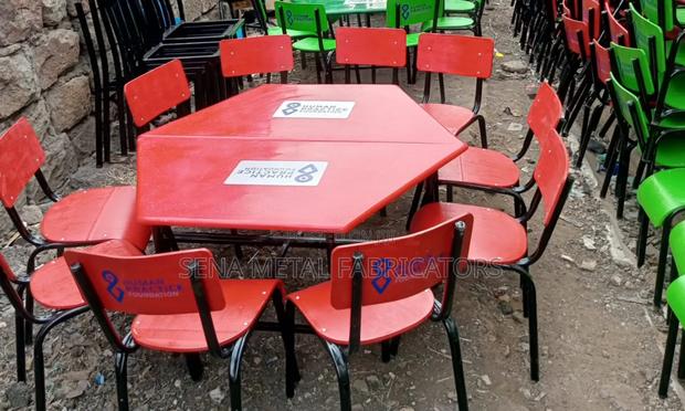 Kindergarten Set With Red Top and Chairs.
