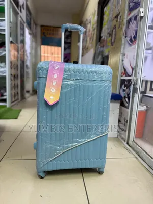 Sky Blue Rubber Suitcase in Large Size (25kgs) Height 66cm at 4000