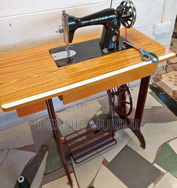 New Singer Sewing Machine/ Imported Singer Sewing Machine With Stand - main view