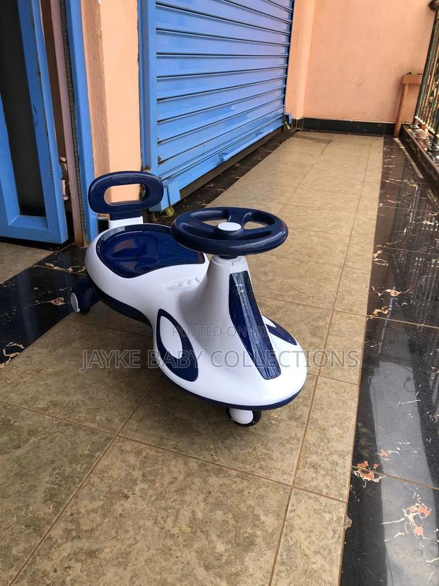 Kids Swing Car Ride-on Vehicle - thumbnail 8