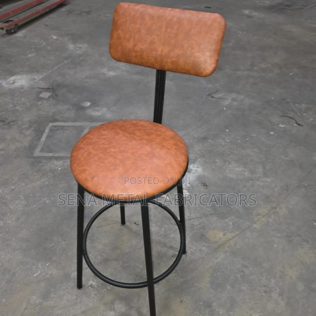 Modern Armless Backrest Counter Stool With Brown Cushion. - main view