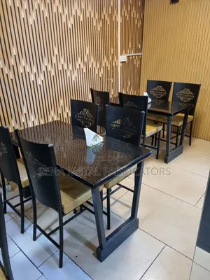 Restaurant Set With Laser-Cut Design Chairs.
