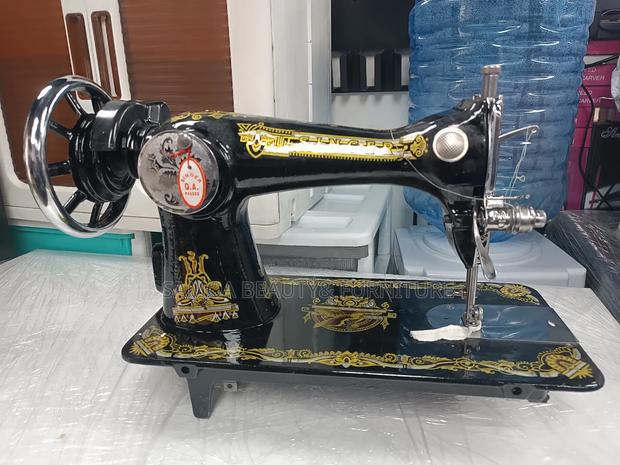Singer Sewing Machine - thumbnail 8