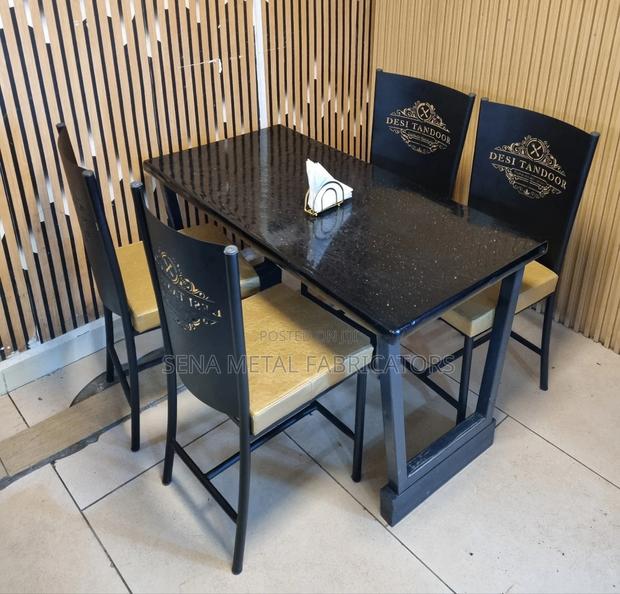 Hotel Dining Set of 4 Chairs and a Table.