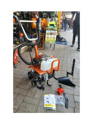Durable Gasoline Tiller – Perfect for Loosening Mixing Soil