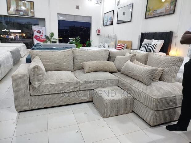 Sleek Casual 6 Seater L Sofa With a Puff