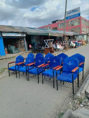 Church Branded Chairs With Varnished Wooden Armrest