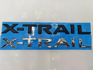 Xtrail Rear Badge in Black or Silver