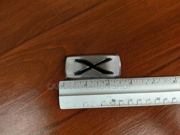 Toyota Xmark Boot Badge - main view