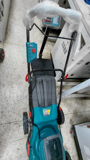 Total Brand Battery Powered Lawn Mower Machine.