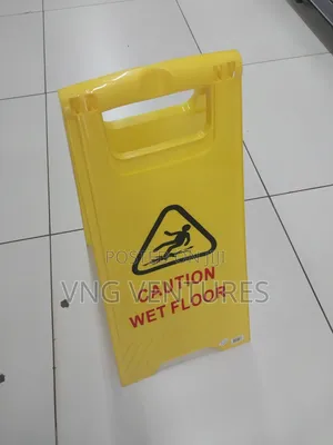 Caution Wet Flow Signage