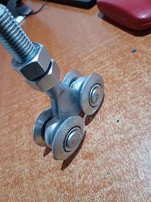 Overhead Hanging Door Rollers - thumbnail 2