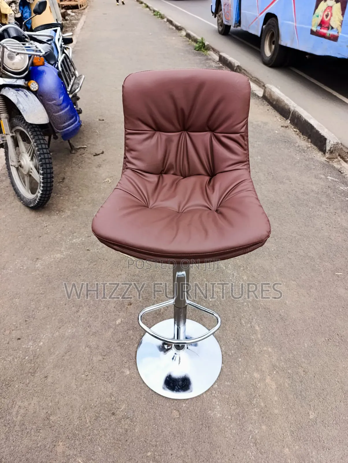 Brown Faux Leather Bar Stool With a Chrome Base