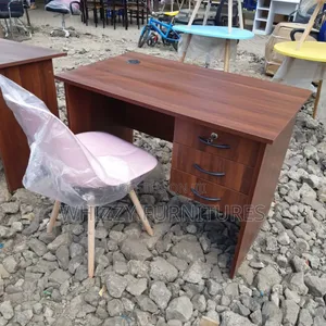 Wooden Executive Office Desk and a Eames-Style Dining Chair
