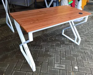 Study Desk With a Metallic Base and a Wooden Too
