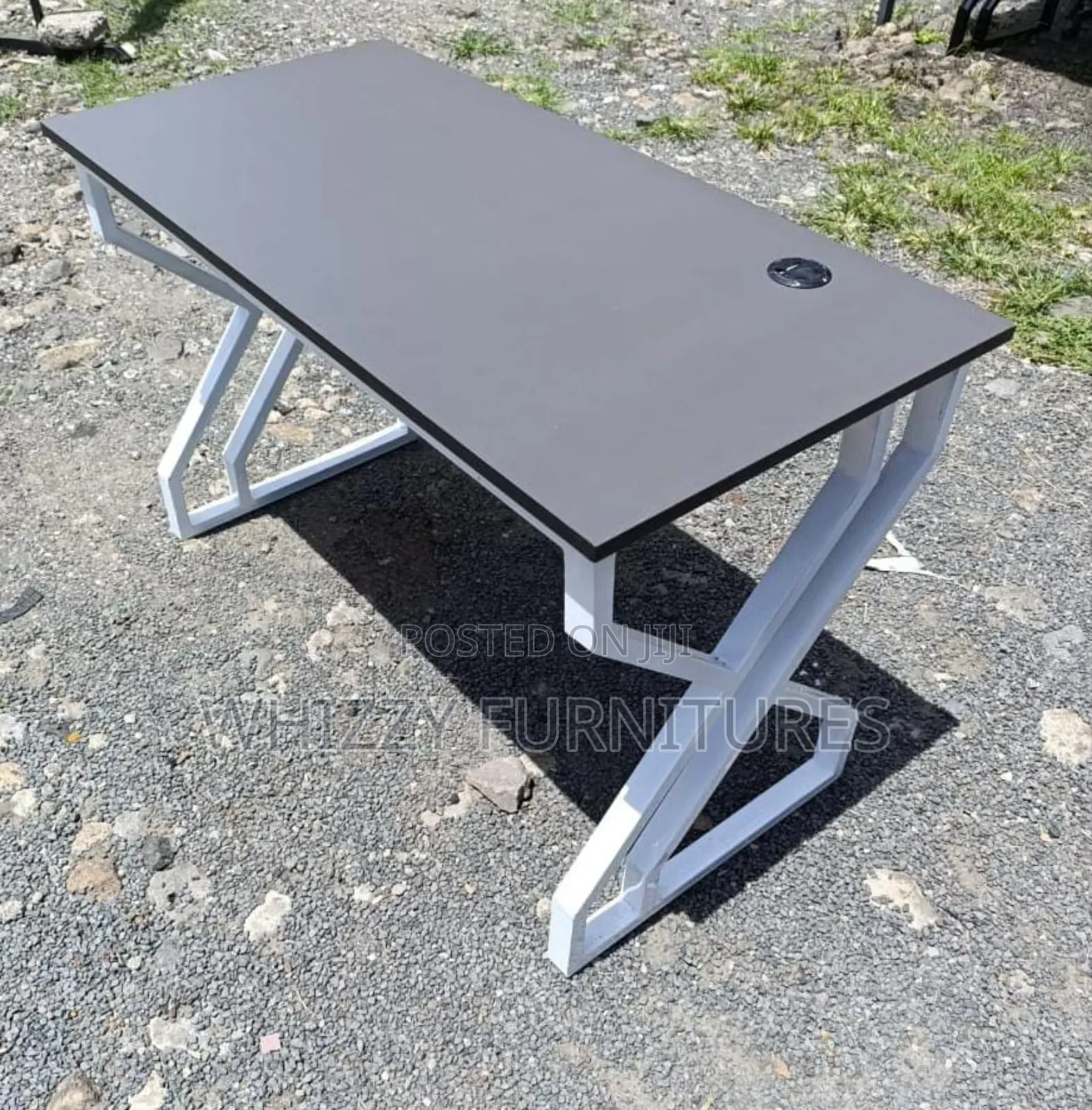Modern Office Desk With a Grey Top and White Metal Legs