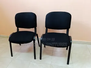 Black Fabric Visitor's Chair With a Low Back and Armrests
