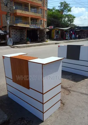 White and Brown Reception Desk With Laminated MDF Board