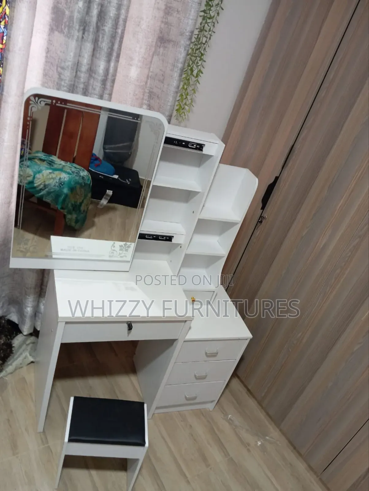 Dressing Table With a Mirror, Multiple Drawers and Shelves
