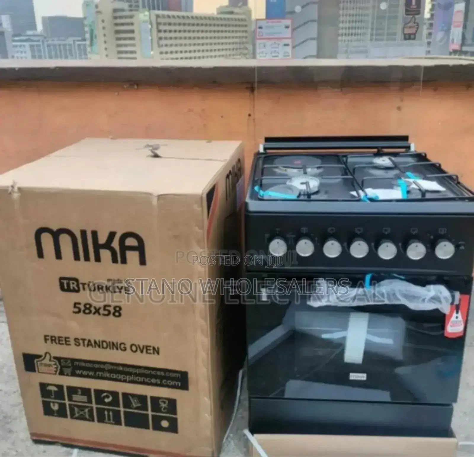 Colour Grey. Mika 58by58 Standing Cooker. 3+1