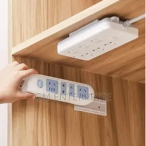 *Powerful Traceless Wall-Mounted Sticker Plug Fixer