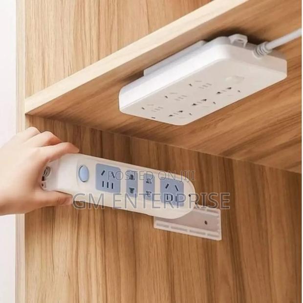 *Powerful Traceless Wall-Mounted Sticker Plug Fixer