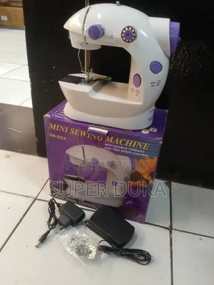 Portable Mini Sewing Machine, Model Sm-202a.