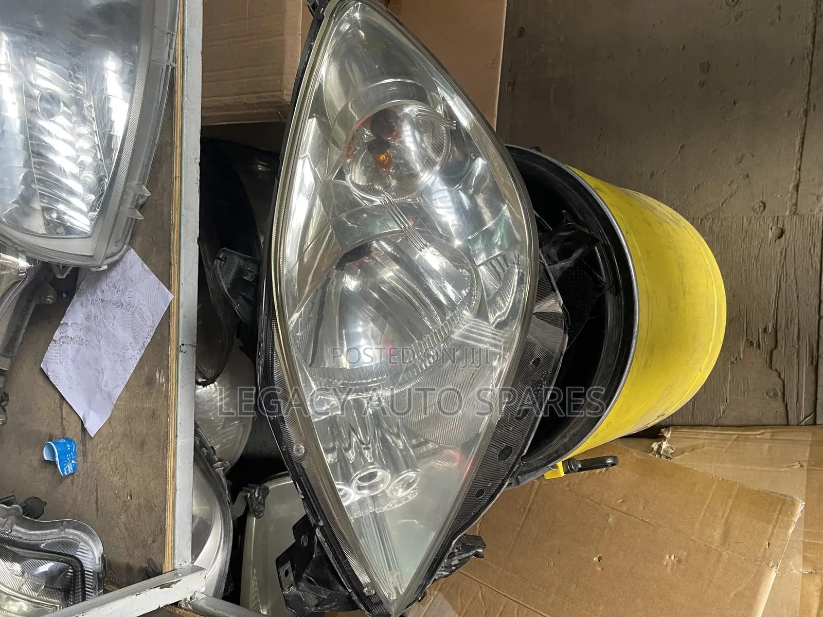 Mazda Demio Headlight (2005)